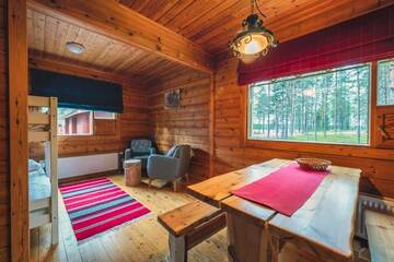 Фото номера Коттедж с 2 спальнями и сауной Дома для отпуска Torassieppi Cottages г. Särkijärvi 6
