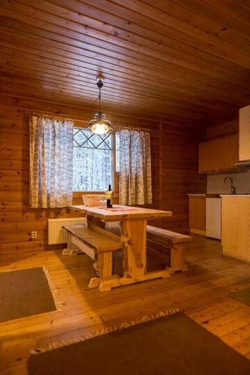 Фото номера Коттедж с 2 спальнями и сауной Дома для отпуска Torassieppi Cottages г. Särkijärvi 17