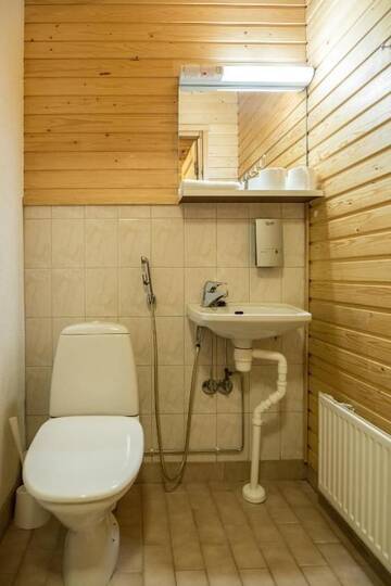 Фото номера Коттедж с 2 спальнями и сауной Дома для отпуска Torassieppi Cottages г. Särkijärvi 15