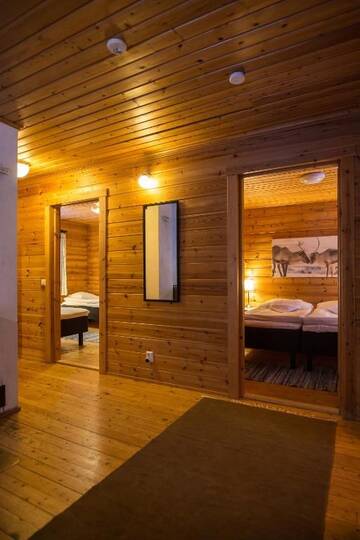 Фото номера Коттедж с 2 спальнями и сауной Дома для отпуска Torassieppi Cottages г. Särkijärvi 11
