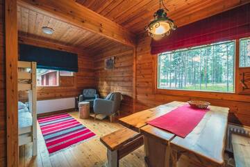 Фото номера Коттедж с 2 спальнями и сауной Дома для отпуска Torassieppi Cottages г. Särkijärvi 5