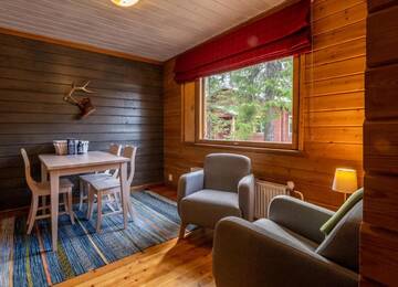 Фото номера Коттедж с 2 спальнями Дома для отпуска Torassieppi Cottages г. Särkijärvi 6